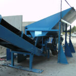 Convoyeur à bande caoutchouc pour le transfert de produits en vrac