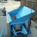 Convoyeur à bande caoutchouc pour le transfert de produits en vrac