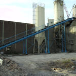 Convoyeur à bande caoutchouc pour le transfert de produits en vrac