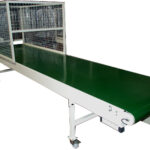 Convoyeur à bande textile et zone de protection